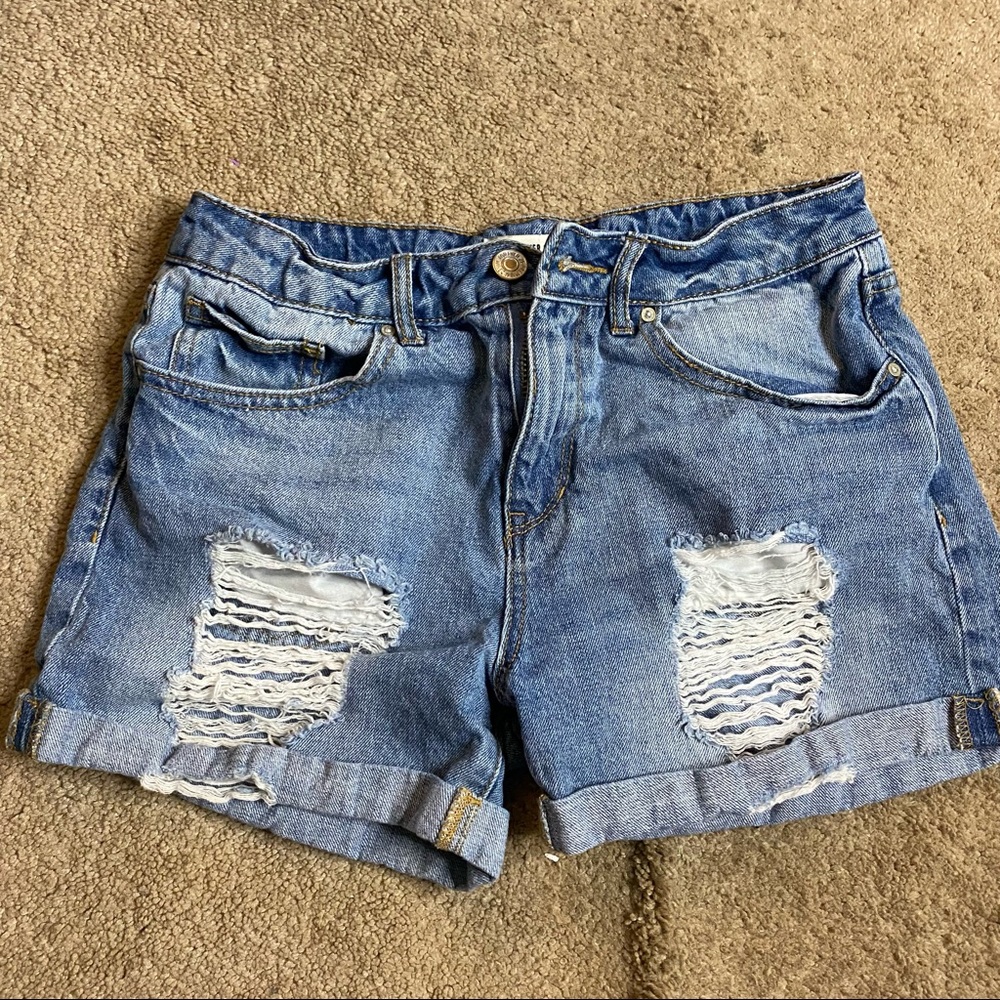 Distressed denim shorts